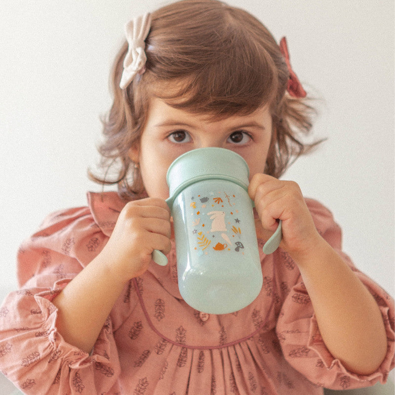 Suavinex Baby Training Cup for Babies 12M+ Leak Proof 360° Perfect Spill-proof for Drinking from any Side of the Rim without Getting Wet 340ml Blue